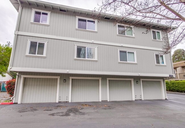 Building Photo - Refreshed 2/2 Second Floor Campbell Condominium in Great Location! Attached Garage & Additional S...