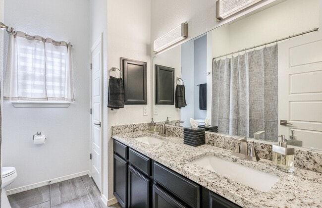 Building Photo - We have a beautiful home fully furnished with 3 bedroom-2 baths plus theater room (or a 4 bed room)