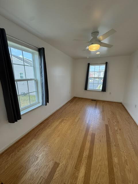 Building Photo - Modern End-Unit Townhome – Solar Powered, Garage, Pet Friendly, and HOA Amenities Included