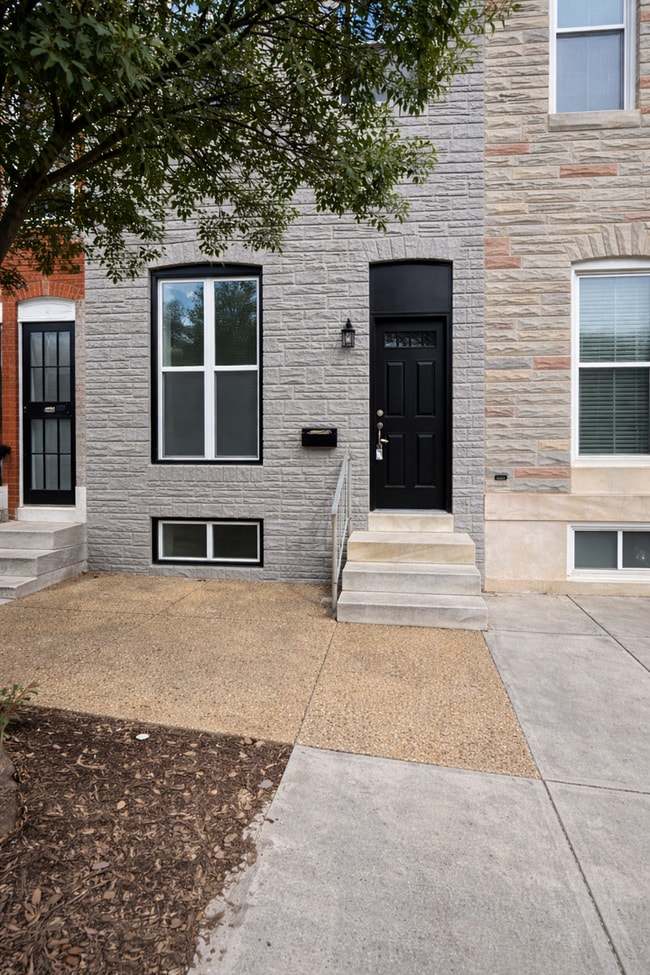 Building Photo - Modern 3BR Rowhome with Finished Lower Level & Rear Deck