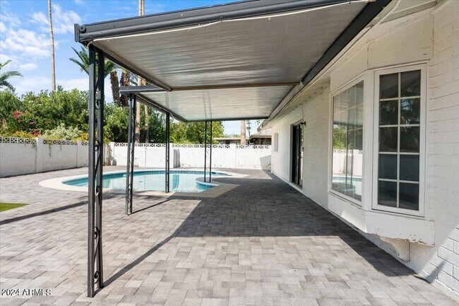 Building Photo - 8207 E Montebello Ave