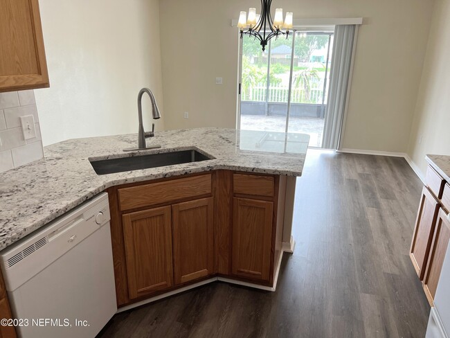 Building Photo - 6580 Gentle Oaks Dr N