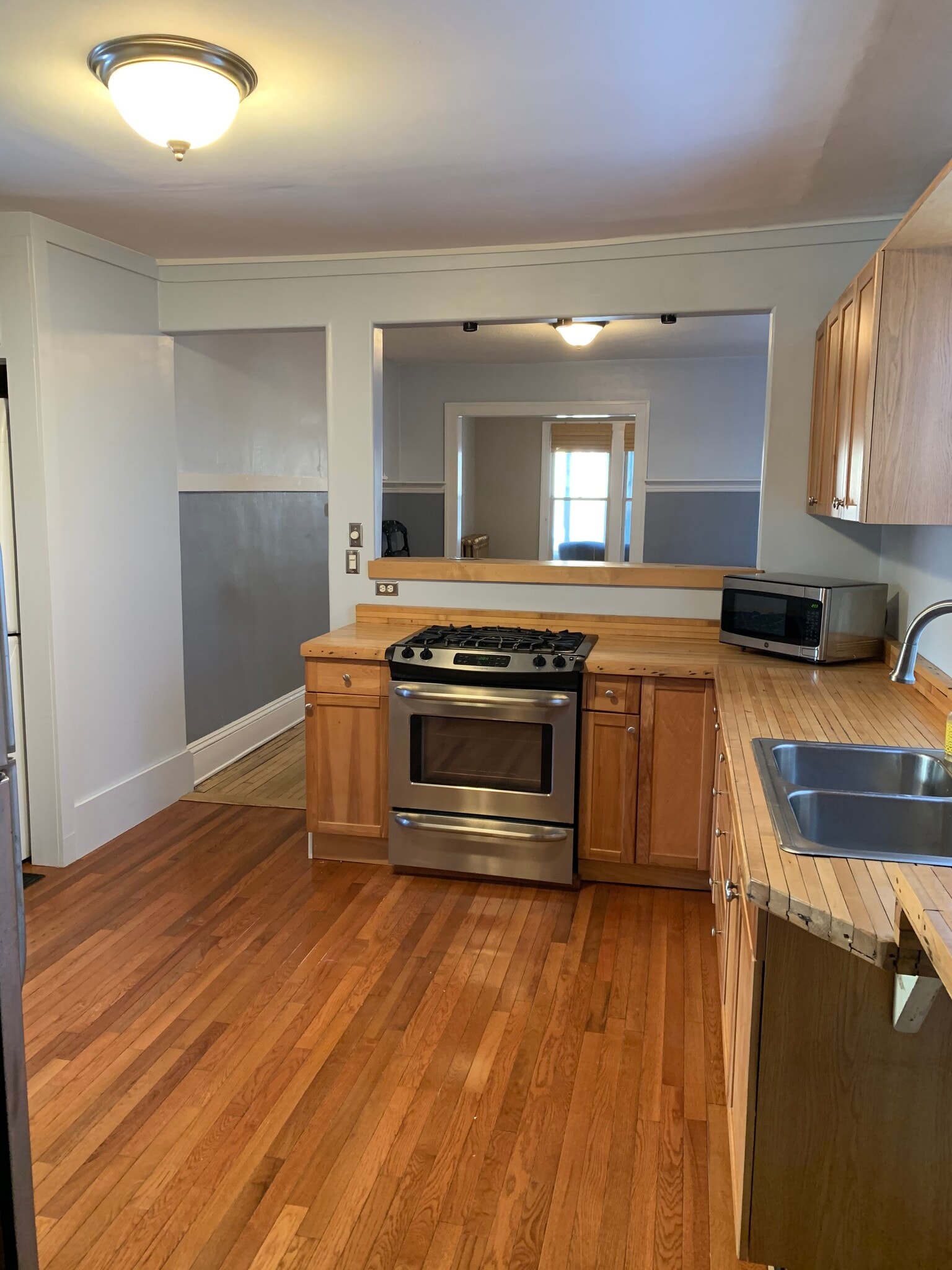 Kitchen. Countertops are reclaimed wood from Bryant Lake Bowl. - 3032 grand ave