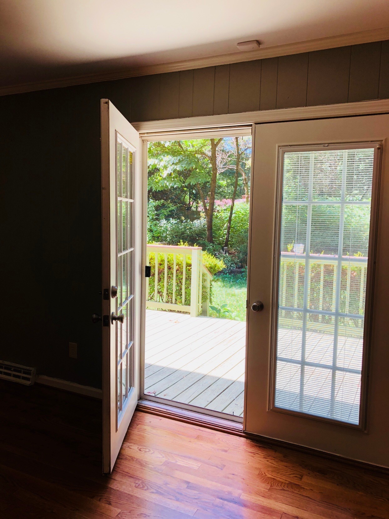 French doors lead to the back deck and back yard bringing the outdoors in! - 3 Tyrol Ct