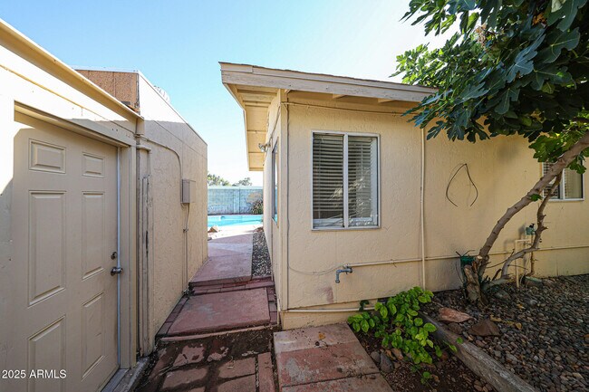 Building Photo - 3408 W Port Au Prince Ln