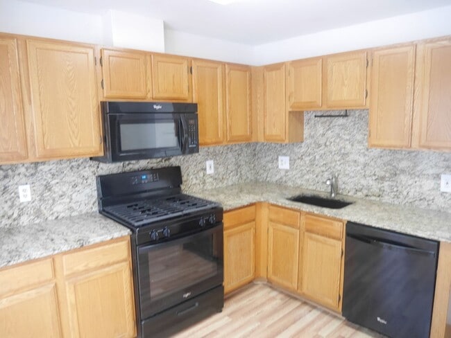 Building Photo - Spacious 2nd Floor Condo in Russett – Prim...