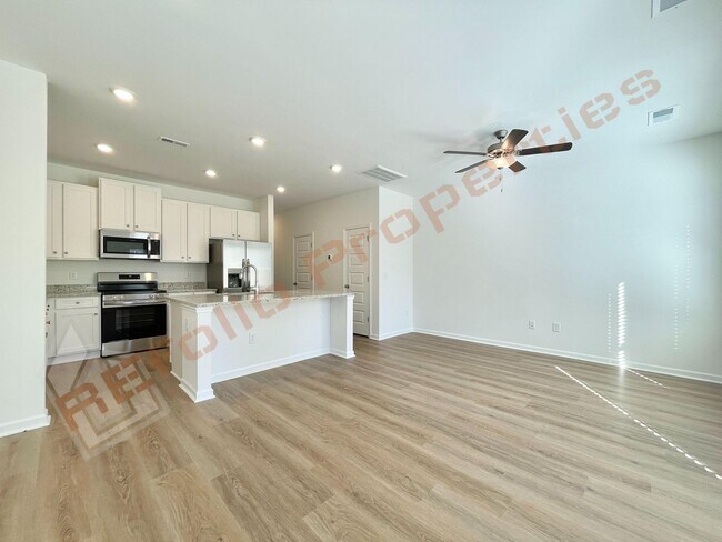 Building Photo - Move In by April 30 & Save $200/Month! Townhome Only $1,695! Regular $1,950 — Available NOW