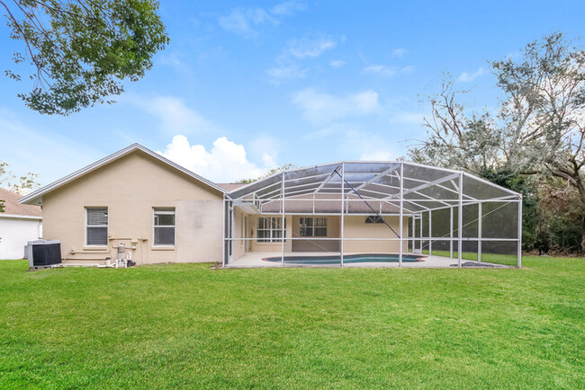 Building Photo - pacious 4-Bedroom Home with Pool