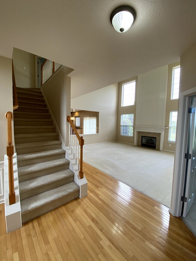 Family Room & Stairs - 14295 Chariots Whisper Dr