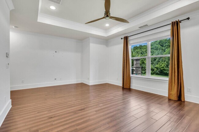 Building Photo - Beautifully maintained and move-in ready, this stunning mostly one-level all-brick home
