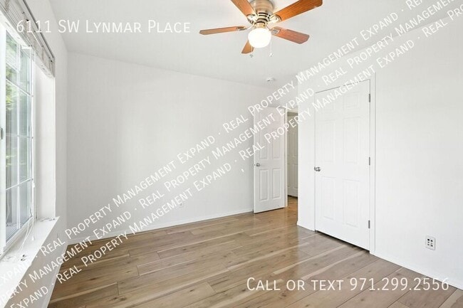 Building Photo - 6111 SW Lynmar Pl