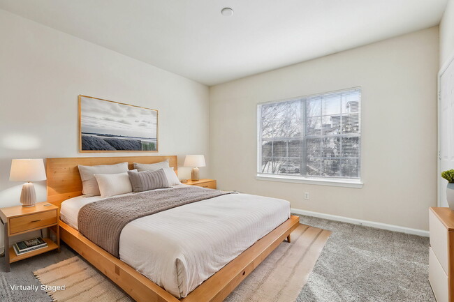 Experience tranquility in this beautifully staged bedroom with abundant natural light. - Redwine Creek