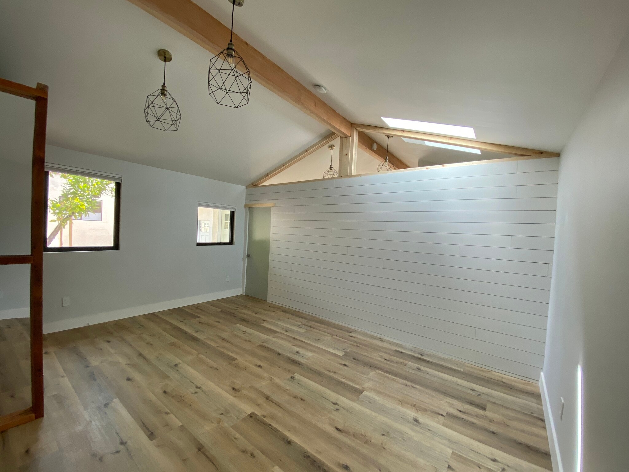 Large bedroom with space for an office - tempered glass above wall provides noise insulation. - 3605 Helms Ave