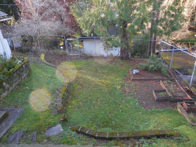 Private, fenced backyard with garden areas - 4626 N Mullen St