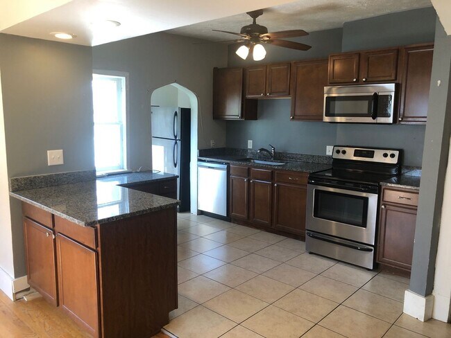 Building Photo - Recently Renovated - Spacious 5 Bedroom, 2...