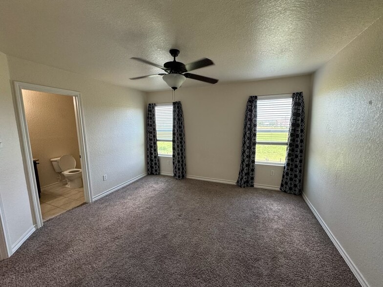 Master Bedroom with open view of field behind the townhouse - 16715 Jupiter Haven