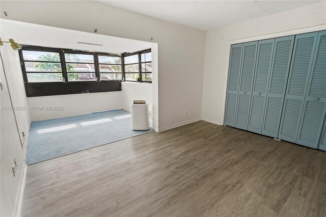 Building Photo - 6556 Racquet Club Dr