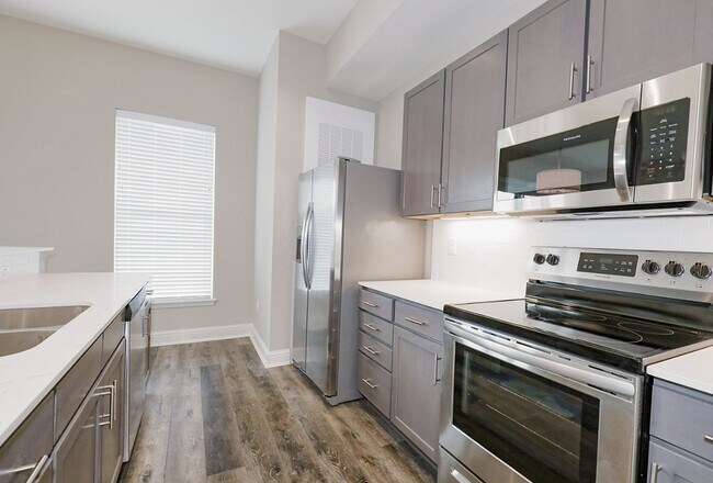 Kitchen - The Flats on Archer - Reduced Rates on All Units!