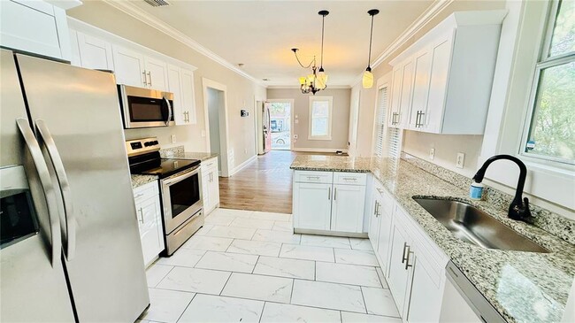 Building Photo - 1210 E 33rd Ave