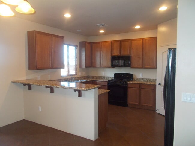 Building Photo - 4 Bedroom Home