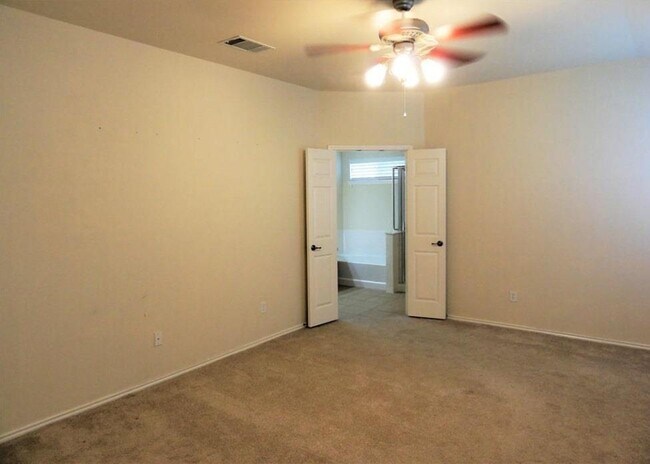 Building Photo - 7810 Squirrel Hollow Dr