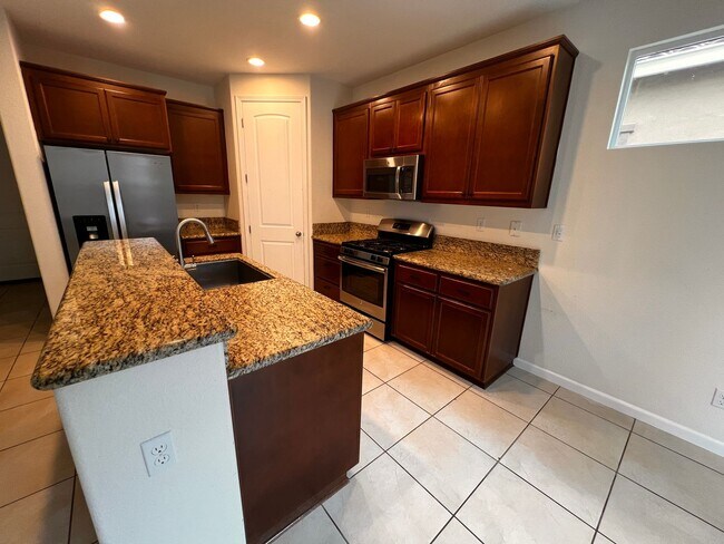 Building Photo - Great looking home and neighborhood in the North Village area close to shopping and freeway access