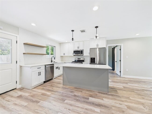 Building Photo - 8810 Slayton Dr