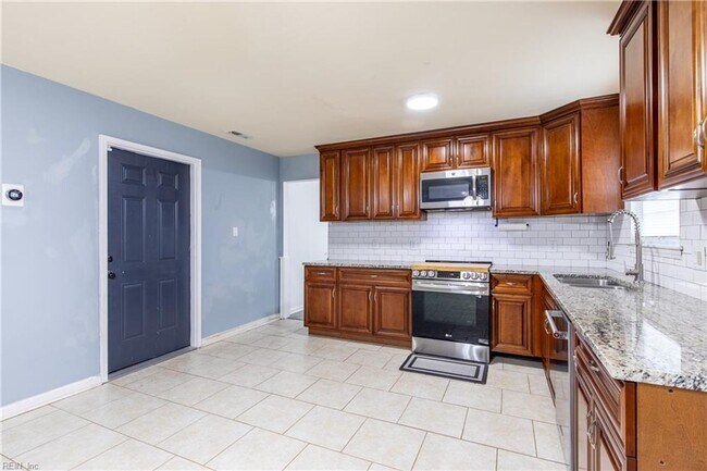 Building Photo - Welcome to this beautifully maintained 4-bedroom! "ASK ABOUT OUR ZERO DEPOSIT"