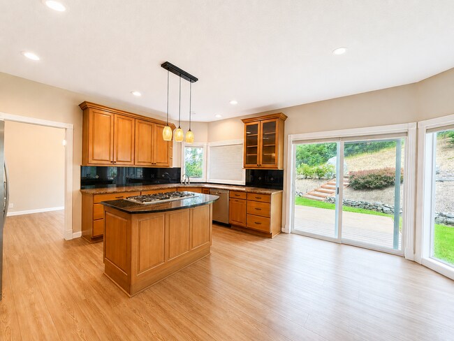 Building Photo - Light-Filled 3 Bedroom Retreat with Waterfall & Fully Fenced Yard