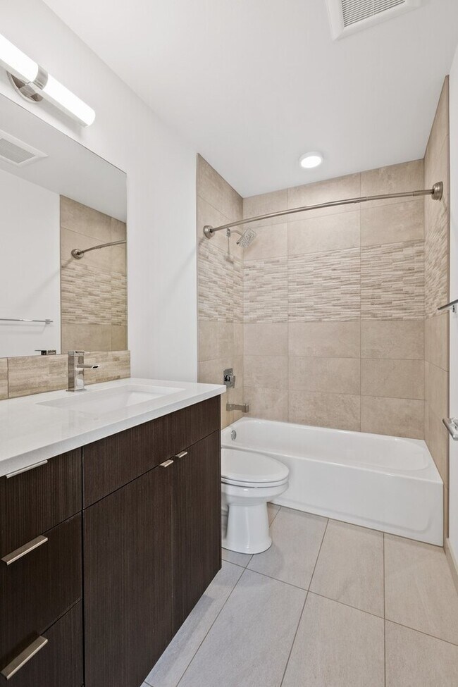 Building Photo - Impeccable Greenwood Townhome with Air Con...