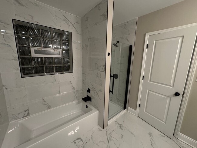 Building Photo - Stunning gut-renovated 3-bedroom, 2-bath condo in South Shore