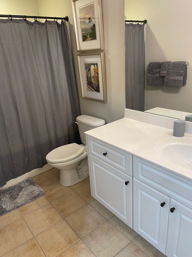 Building Photo - EXECUTIVE FULLY FURNISHED TOWNHOME IN GATED COMMUNITY