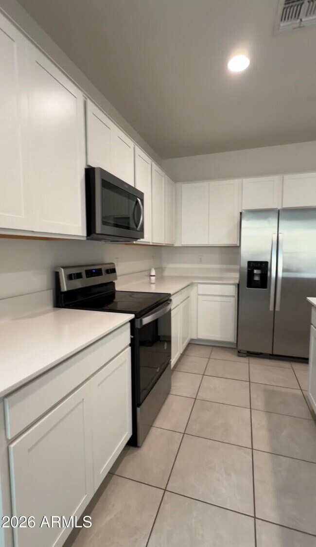 Building Photo - 24066 W Flores Dr