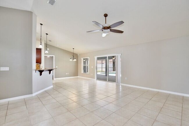 Building Photo - Beautiful 4/2 Pool Home with a Covered Pat...