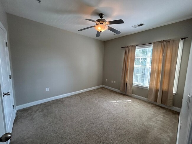 Building Photo - Don't miss this 4-bed, 3-bath condo TWO miles from the ocean!