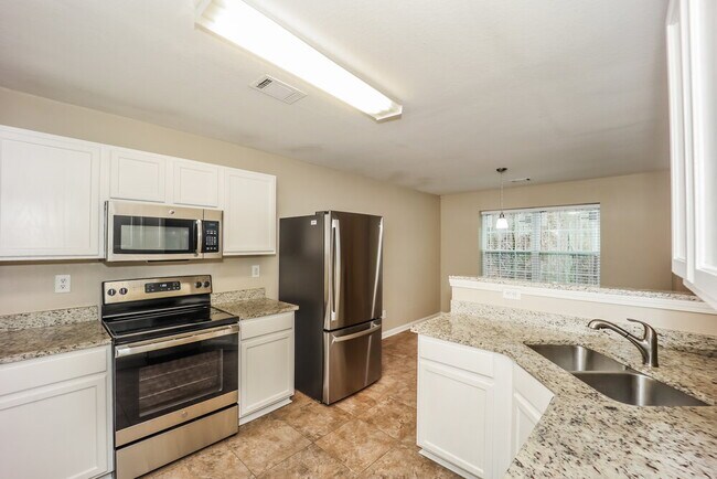 Building Photo - 4421 Ravenwood Dr
