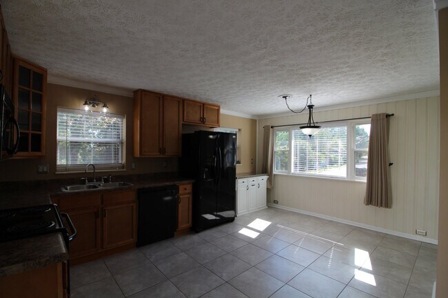 Building Photo - Award winning schools. Stunning home.  Centrally Located. One car garage/fenced in back yard.