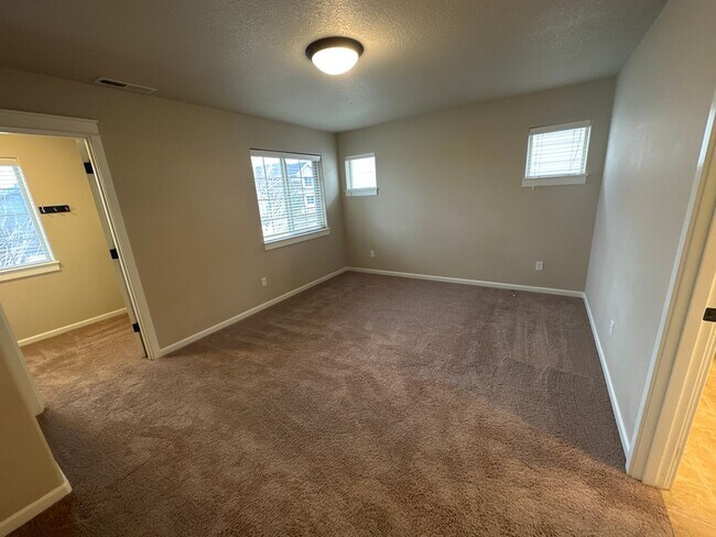 Building Photo - NE 3 Bdrm, 2.5 Bath 1450 sq ft House w/AC and Gas Heat,  All Appliances, Dbl Garage