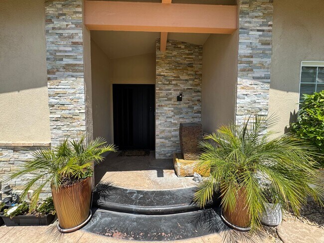 Building Photo - Luxurious Oasis with Resort-Style Pool and...
