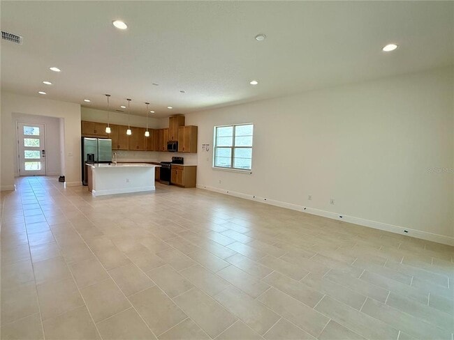 Building Photo - 5211 Buttonsage Dr