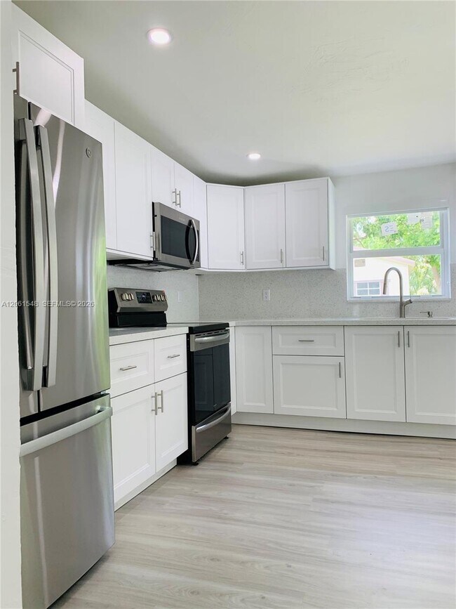 Building Photo - 5441 NW 174th Dr