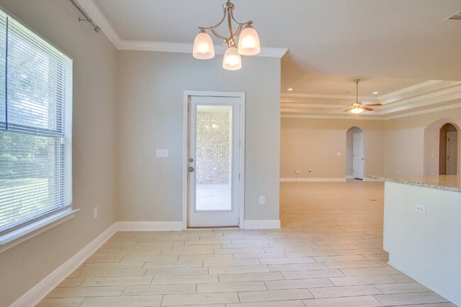 Building Photo - Spacious 4BR Pool Home with Modern Upgrade...