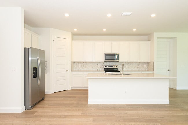 Building Photo - 9062 Dahlia Cir