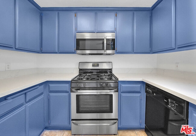 Building Photo - 8741 Darby Ave