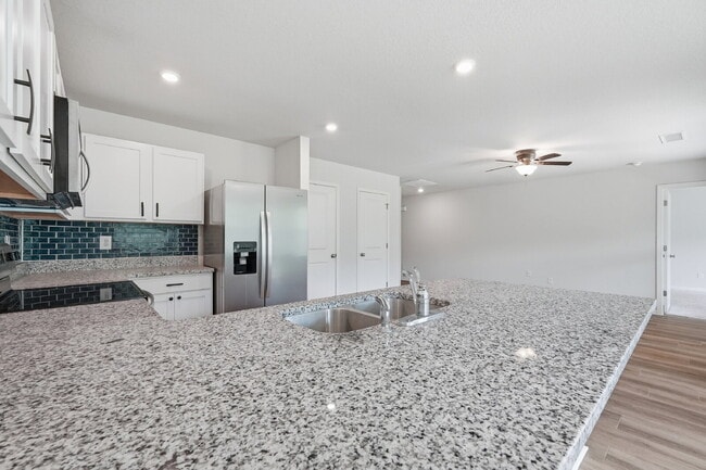 Building Photo - New community! Three bedrooms, two bathrooms and ready for you to move into!