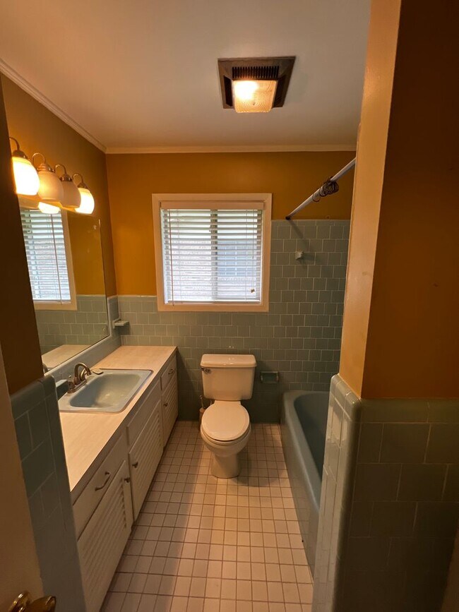 Building Photo - 3 Bedroom, 2 Bathroom, Brick home, Carport...