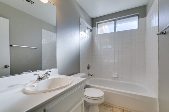 Building Photo - GORGEOUS HOME WITH TONS OF UPGRADES*GATED COMMUNITY WITH A COMMUNITY POOL*