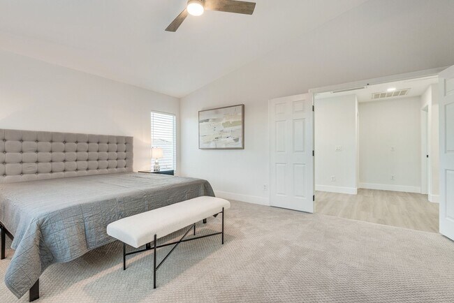 Building Photo - FULLY FURNISHED! Exudes sophistication with designer touches throughout