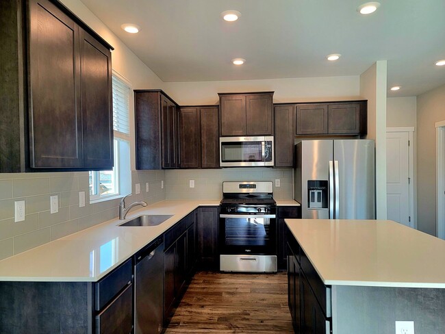 Building Photo - Brand New 3 bed with loft and fully fenced yard in convenient CK location!