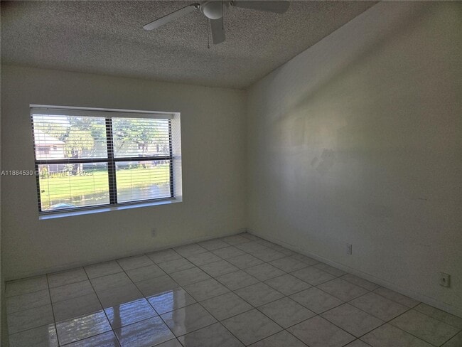 Building Photo - 4599 Carambola Cir S